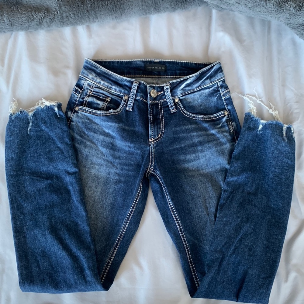 Silver jeans skinny jeans with frayed hem.